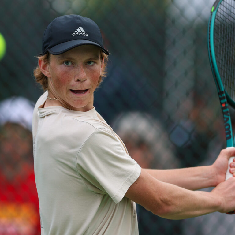 Isaac Denzil Aspinall prepares for a backhand as he battles in the quarterfinals of the Phillip Thomas Memorial Open (1000).